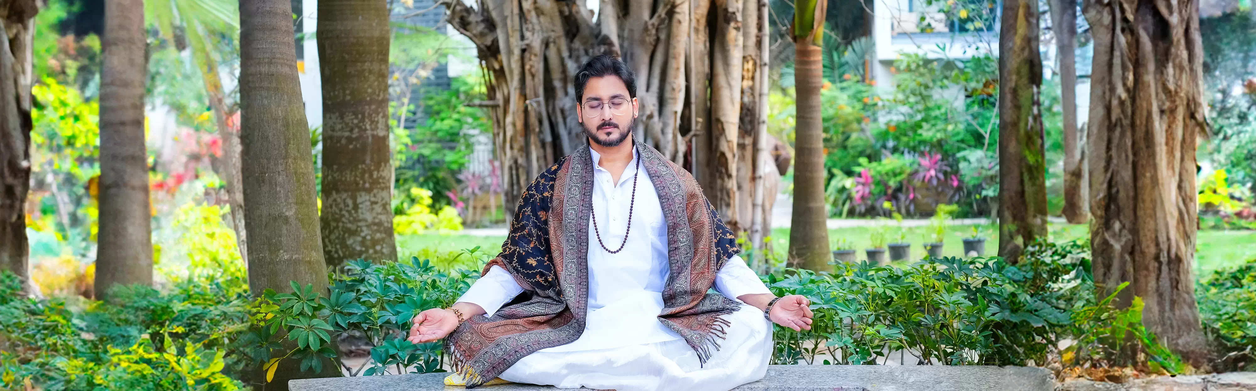 A student practicing yoga exercises at home following a yoga beginners course guided by Gaurav Tribedi of Nabatara Institute.